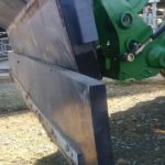 scraper rubber installed on a front end loader