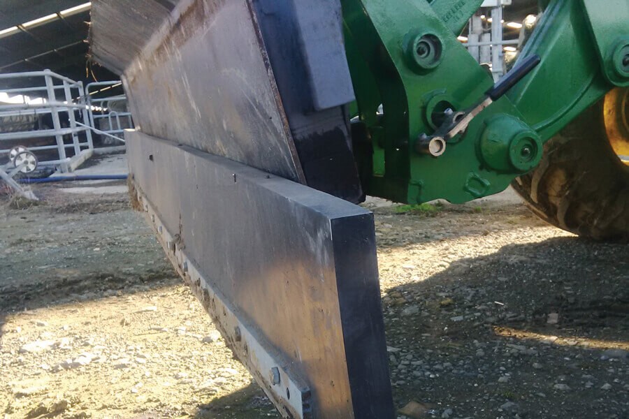 scraper rubber installed on a front end loader